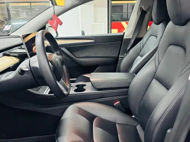 Tesla Model Y — Фото автомобиля 7