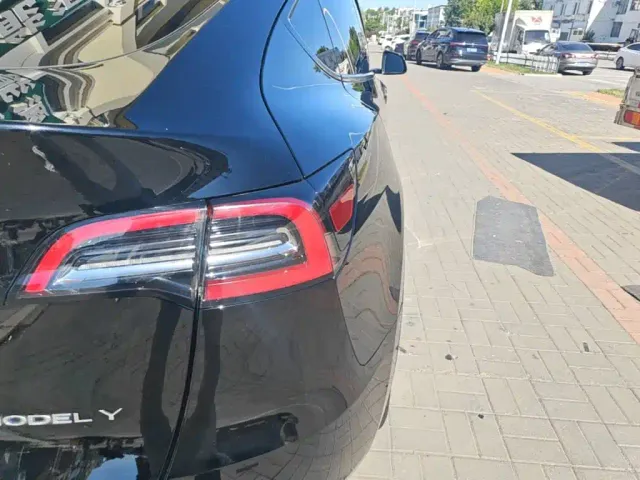 Tesla Model Y — Фото автомобиля 7