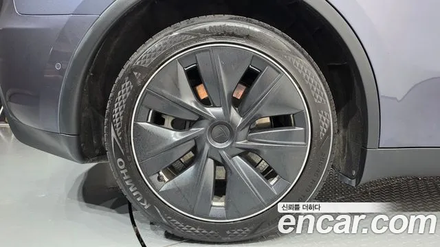 Tesla Model Y — Фото автомобиля 5