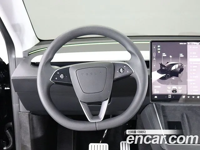 Tesla Model Y — Фото автомобиля 11