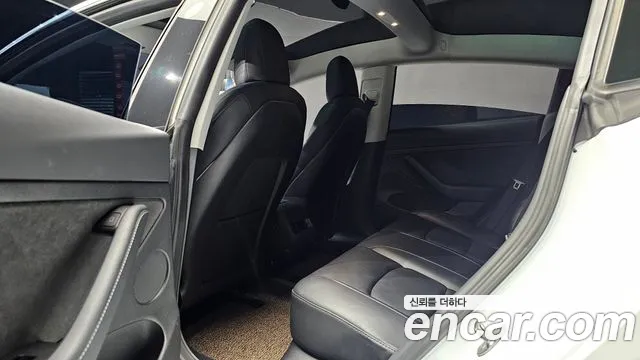 Tesla Model 3 — Фото автомобиля 8
