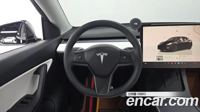 Tesla Model Y — Фото автомобиля 12