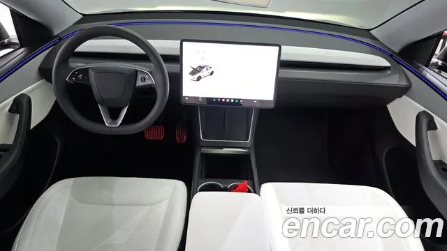 Tesla Model Y — Фото автомобиля 4