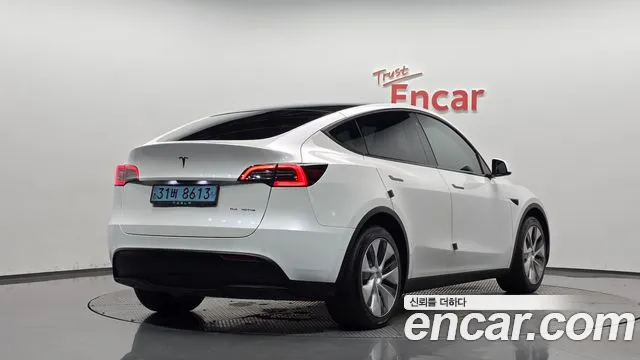 Tesla Model Y — Фото автомобиля 2
