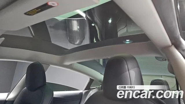 Tesla Model 3 — Фото автомобиля 14