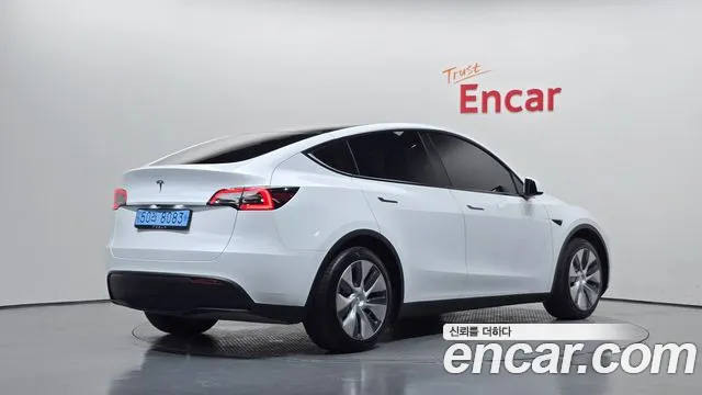 Tesla Model Y — Фото автомобиля 2