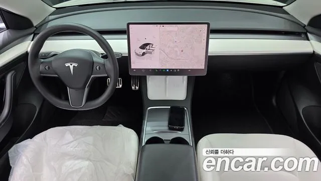 Tesla Model 3 — Фото автомобиля 10
