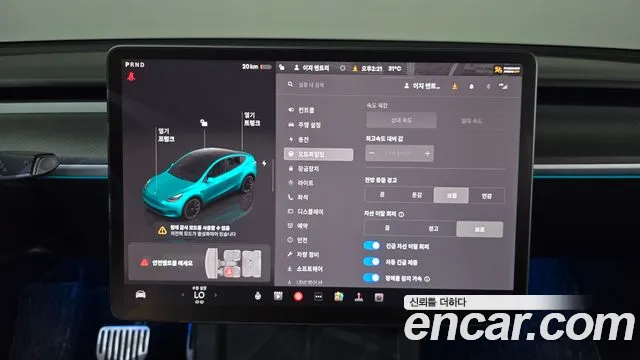 Tesla Model Y — Фото автомобиля 16