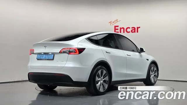 Tesla Model Y — Фото автомобиля 2