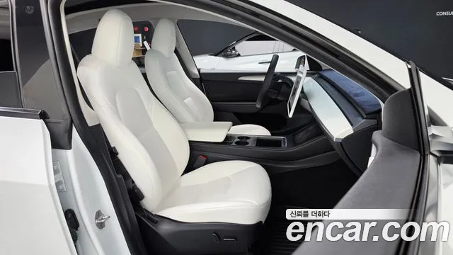 Tesla Model Y — Фото автомобиля 17