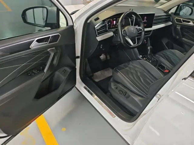 Volkswagen Tiguan L — Фото автомобиля 15