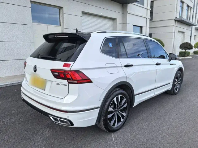 Volkswagen Tiguan L — Фото автомобиля 9
