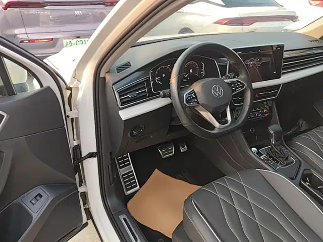 Volkswagen Tiguan L — Фото автомобиля 15