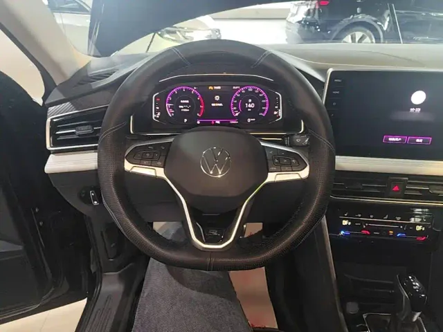 Volkswagen Tiguan L — Фото автомобиля 10