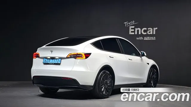 Tesla Model Y — Фото автомобиля 2