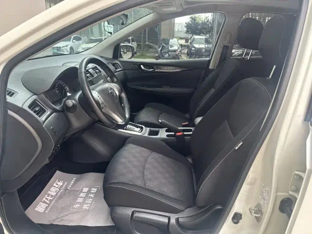 Nissan Tiida — Фото автомобиля 9