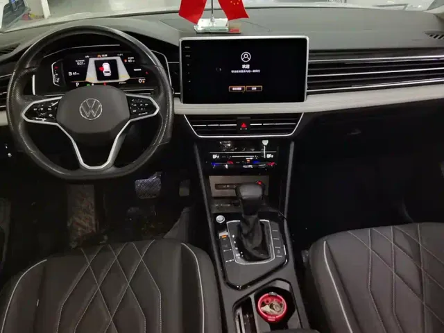 Volkswagen Tiguan L — Фото автомобиля 12