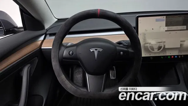 Tesla Model 3 — Фото автомобиля 19