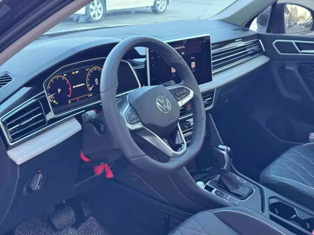 Volkswagen Tiguan L — Фото автомобиля 9