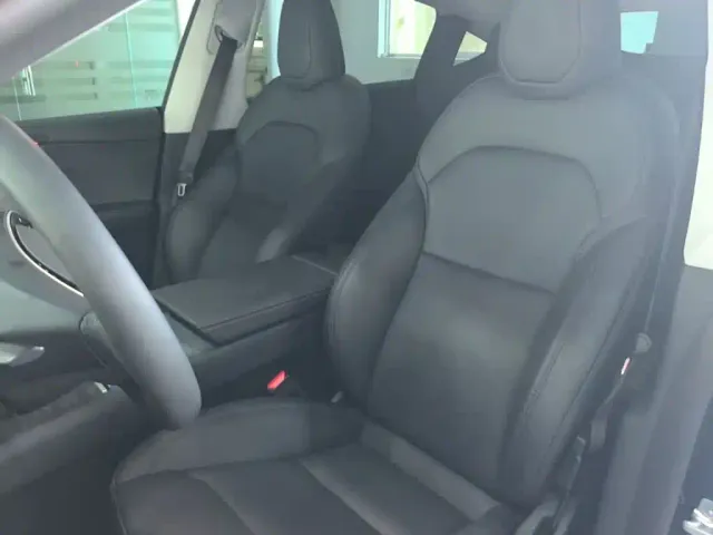 Tesla Model Y — Фото автомобиля 14