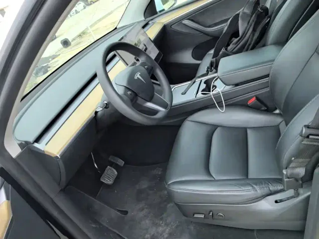 Tesla Model Y — Фото автомобиля 7