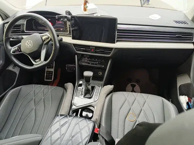 Volkswagen Tiguan L — Фото автомобиля 11