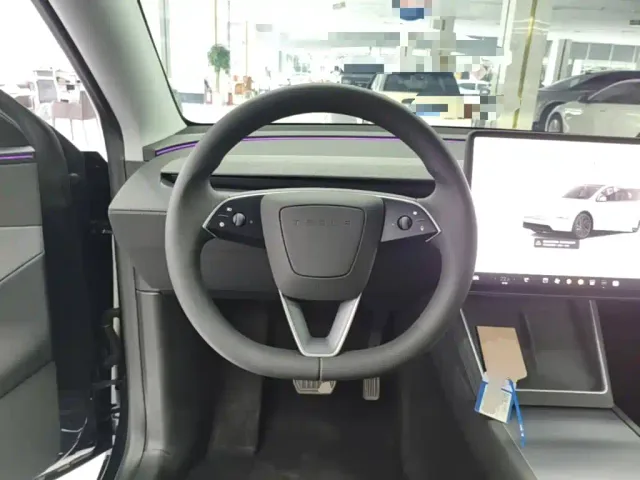 Tesla Model Y — Фото автомобиля 10