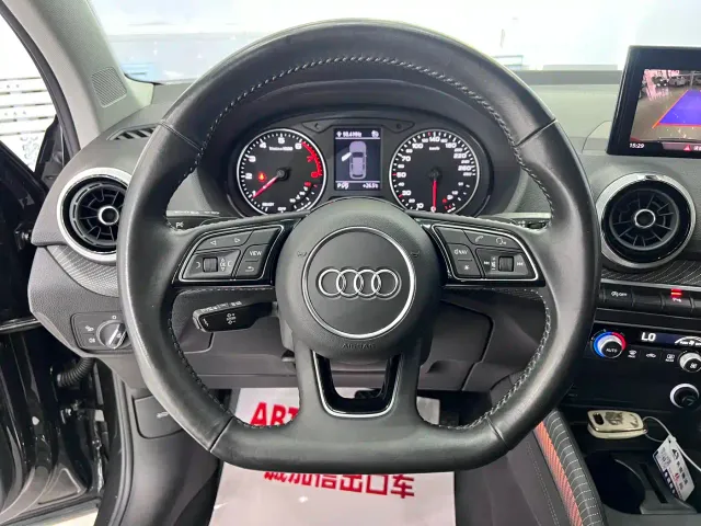 Audi Q2L — Фото автомобиля 10