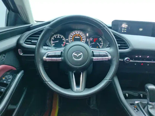 Mazda Axela — Фото автомобиля 15