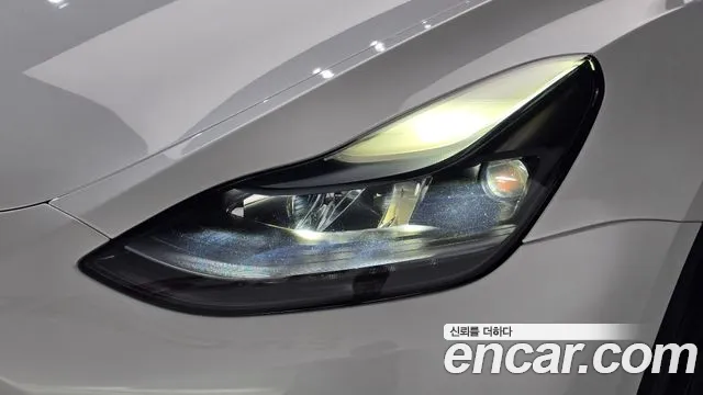 Tesla Model Y — Фото автомобиля 7