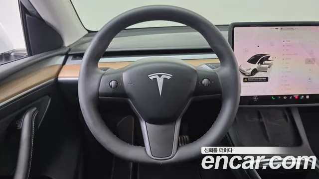 Tesla Model Y — Фото автомобиля 13