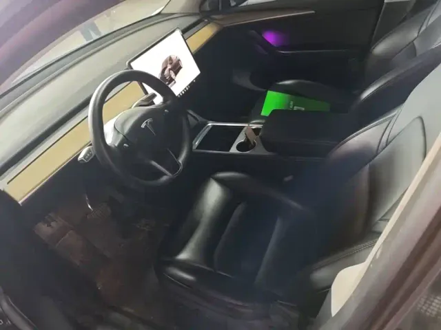 Tesla Model Y — Фото автомобиля 14