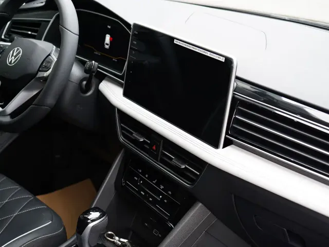 Volkswagen Tiguan L — Фото автомобиля 11