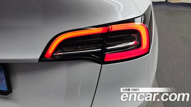 Tesla Model Y — Фото автомобиля 8
