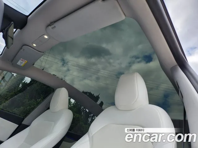 Tesla Model Y — Фото автомобиля 18