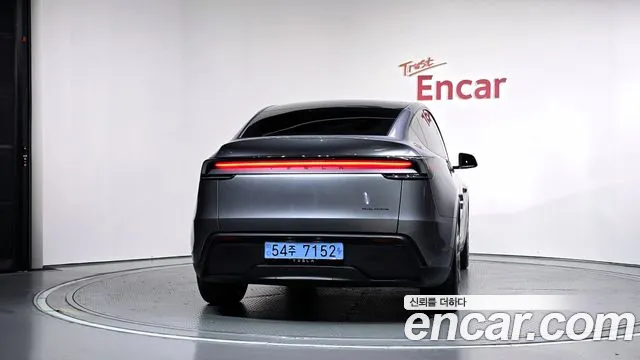 Tesla Model Y — Фото автомобиля 4