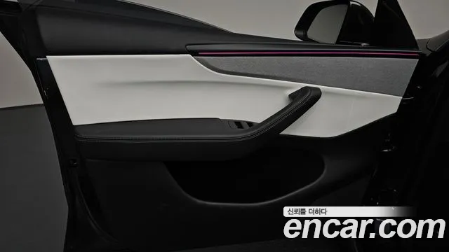 Tesla Model Y — Фото автомобиля 24
