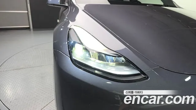 Tesla Model Y — Фото автомобиля 22
