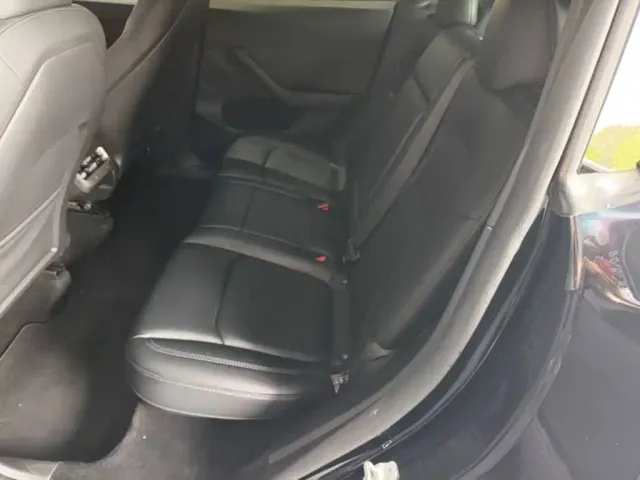 Tesla Model Y — Фото автомобиля 16