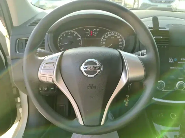 Nissan Tiida — Фото автомобиля 10