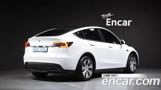 Tesla Model Y — Фото автомобиля 2