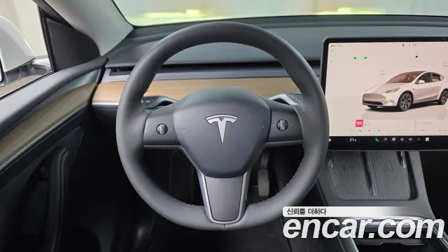 Tesla Model Y — Фото автомобиля 12