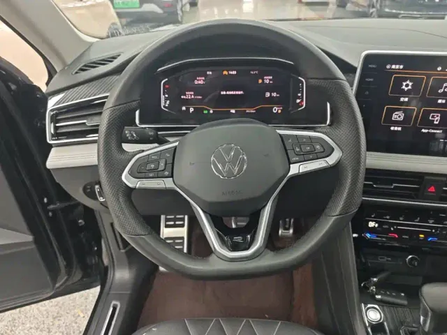Volkswagen Tiguan L — Фото автомобиля 10