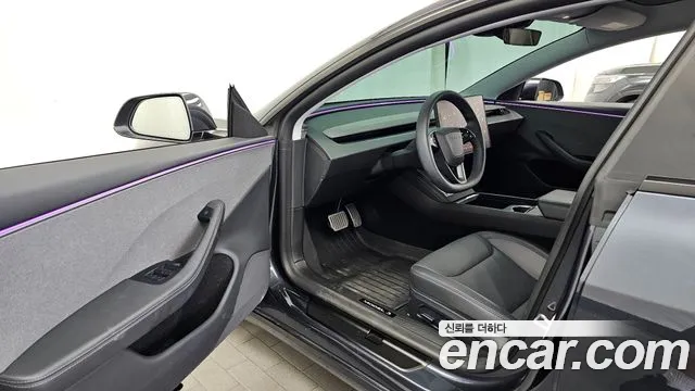 Tesla Model 3 — Фото автомобиля 10