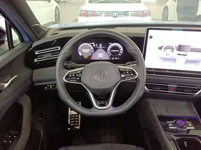 Volkswagen Tiguan L — Фото автомобиля 10