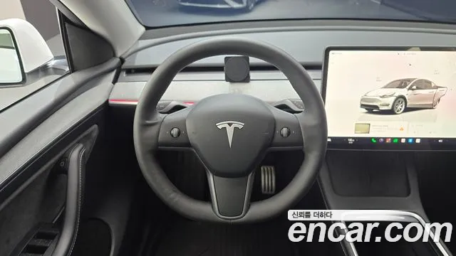 Tesla Model Y — Фото автомобиля 13