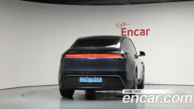 Tesla Model Y — Фото автомобиля 4