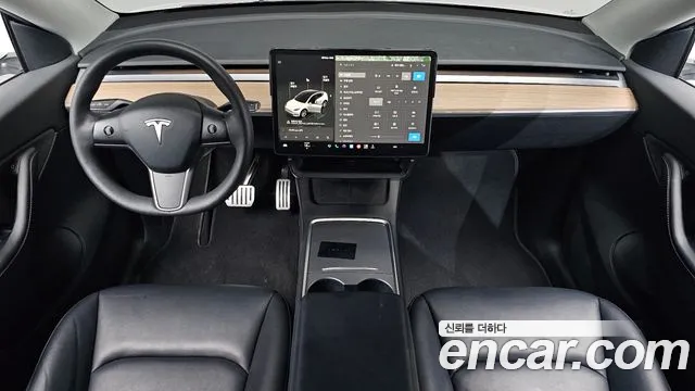 Tesla Model Y — Фото автомобиля 10