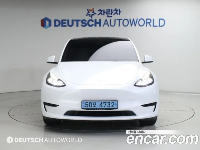Tesla Model Y — Фото автомобиля 3