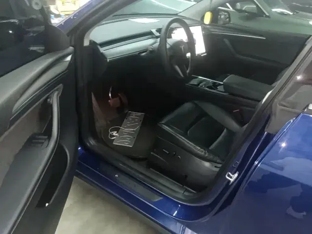 Tesla Model Y — Фото автомобиля 14